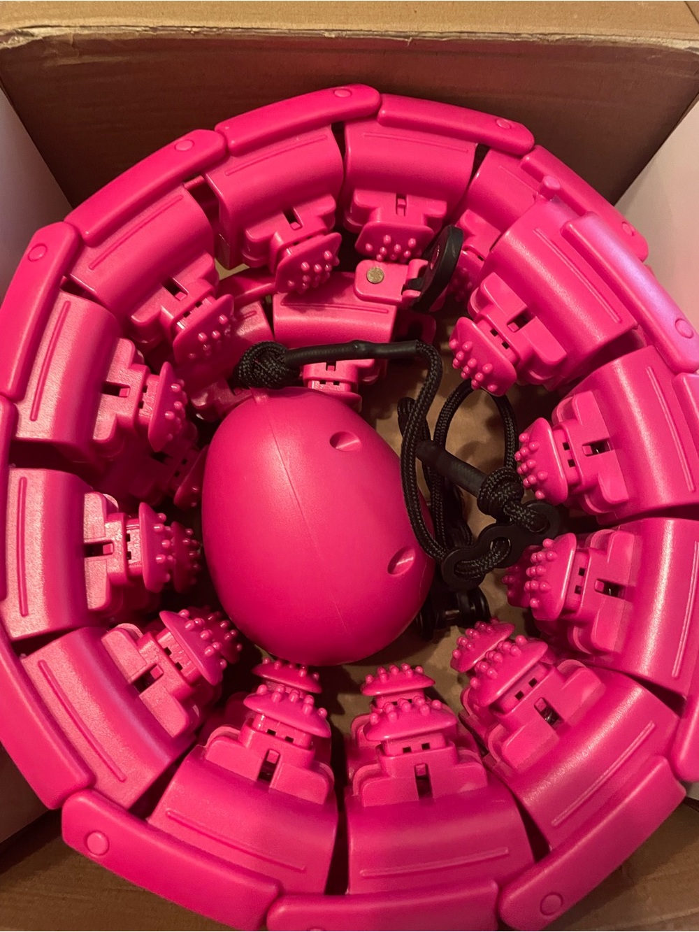 Pink weighted hula hoop